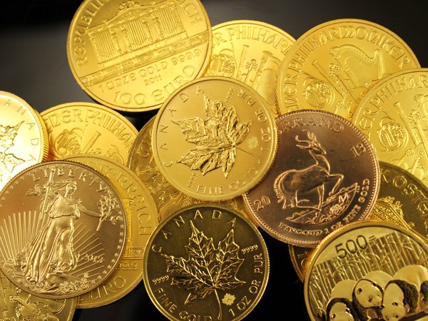 Goldmünzen wie Krügerrand und Maple Leaf